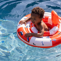 De Swim Essentials baby zwemband red white whale is het perfecte accessoire wanneer je samen met je kleintje gaat zwemmen. Dankzij deze babyfloat kan je kleintje ontspannen en veilig ronddobberen in het water. VanZus.