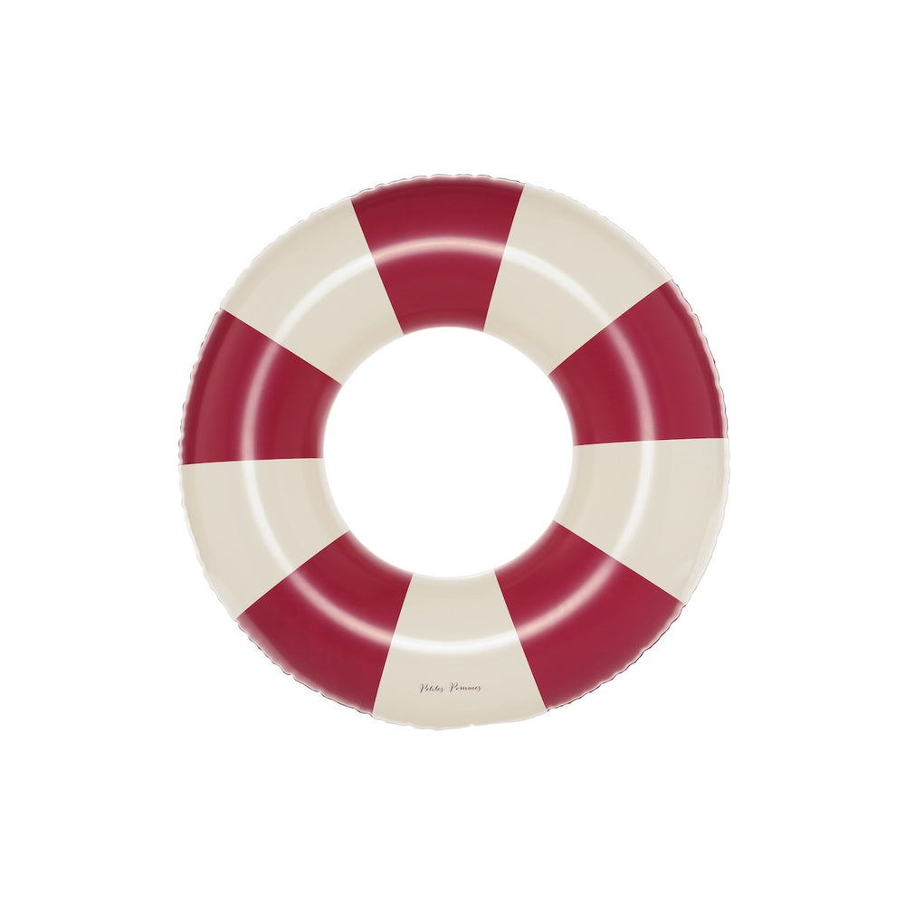 De Petites Pommes Olivia zwemband in de kleur Ruby red (rood) is een opblaasbare zwemband met een diameter van 45cm. Deze zwemband heeft een leuk en kleurrijk ontwerp in een streep design. VanZus