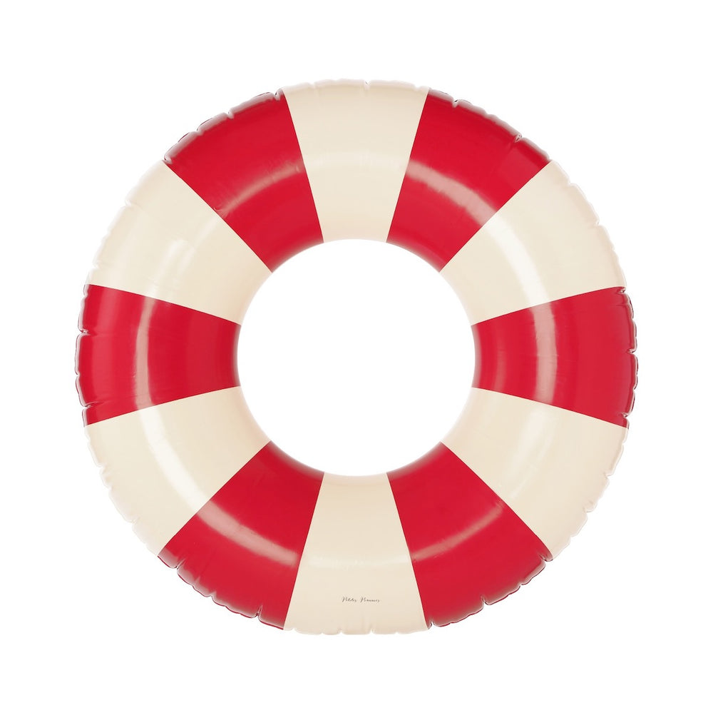 De Petites Pommes Sally zwemband in de kleur Signal (rood) is een opblaasbare zwemband met een diameter van 90cm. Deze zwemband heeft een leuk en kleurrijk ontwerp in een streep design. VanZus