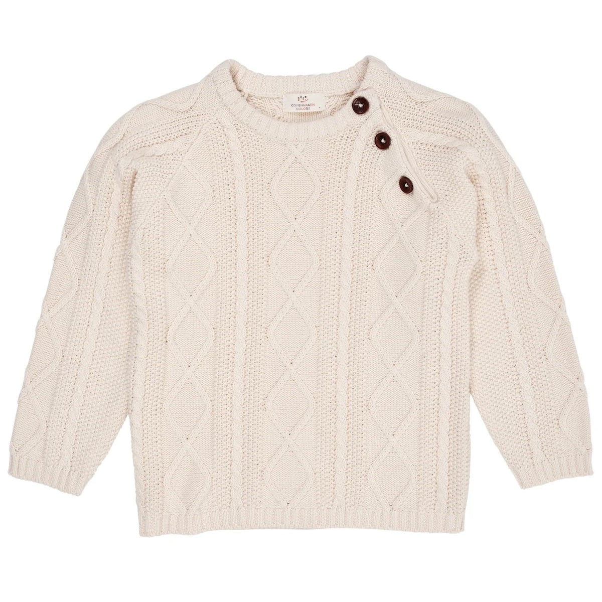 De Copenhagen Colors knit trui in de kleur cream is een heerlijk warme trui. Deze trui is een echte klassieker en daardoor onmisbaar in de kledingkast van je kindje. VanZus.