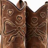 De Copenhagen Colors limited ranger gevoerde cowboylaarzen cognac bow cognac zijn winterlaarzen met karakter. De binnenkant is gevoerd met wol, de buitenkant is van sterk leer. VanZus