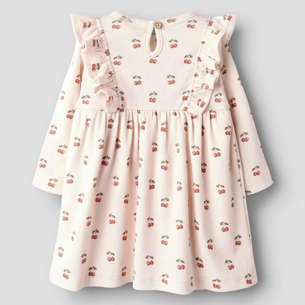 De Lil' Atelier lavo ena romperjurk in silver peony cherry is een prachtige jurk die de garderobe van je kind een stijlvolle upgrade geeft. VanZus