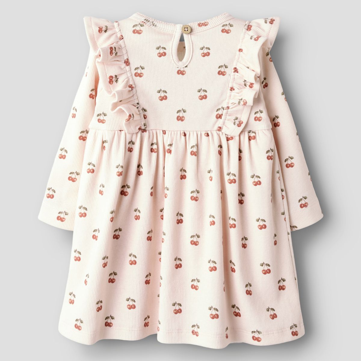De Lil' Atelier lavo ena romperjurk in silver peony cherry is een prachtige jurk die de garderobe van je kind een stijlvolle upgrade geeft. VanZus