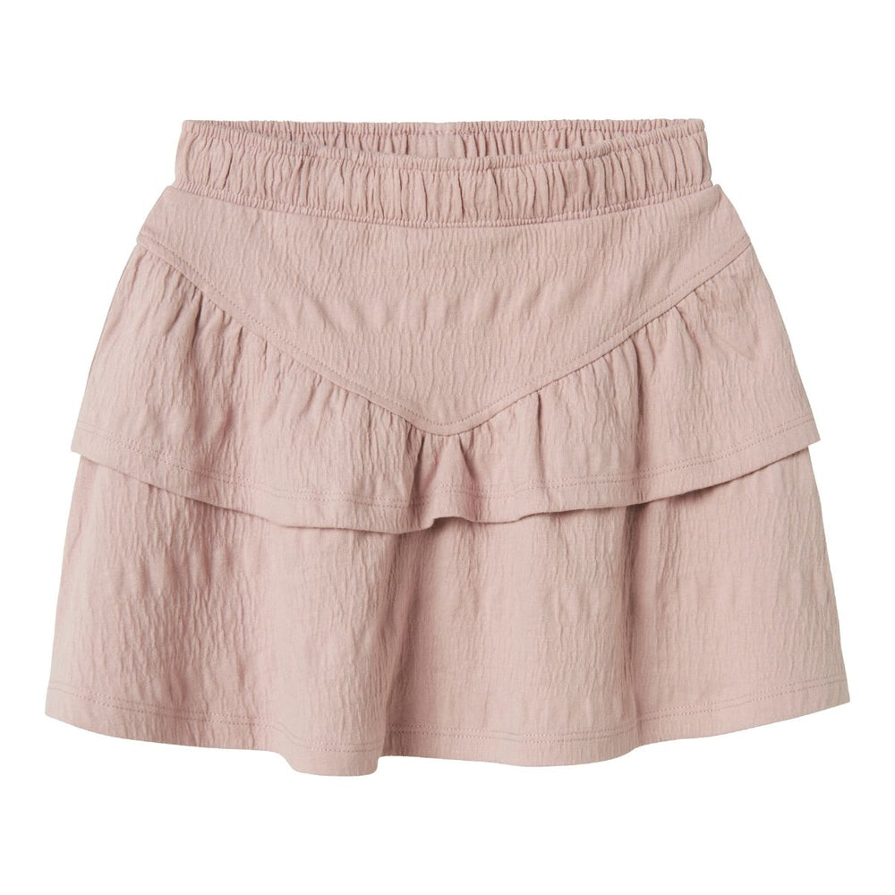 Creëer de liefste outfits met dit leuke kesia rokje in de kleur burnished lilac van het merk Name It. Dit rokje heeft een prachtige roze kleur en een romantische look. Dit is een trendy rok voor speciale gelegenheden of doordeweeks met ruimte om te bewegen en te spelen. VanZus