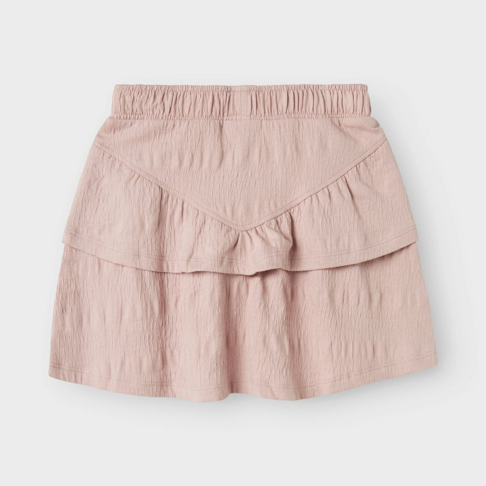Creëer de liefste outfits met dit leuke kesia rokje in de kleur burnished lilac van het merk Name It. Dit rokje heeft een prachtige roze kleur en een romantische look. Dit is een trendy rok voor speciale gelegenheden of doordeweeks met ruimte om te bewegen en te spelen. VanZus