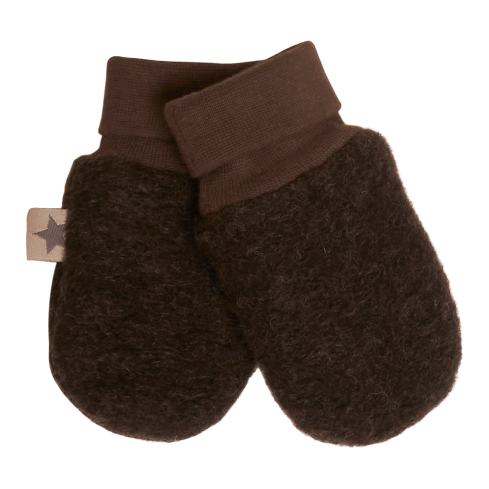 Koude handjes zijn verleden tijd met de Huttelihut wollen wanten brown. Deze bruine handschoenen houden je kleintje warm en knus, terwijl ze tegelijkertijd elke winterse outfit compleet maken. VanZus.