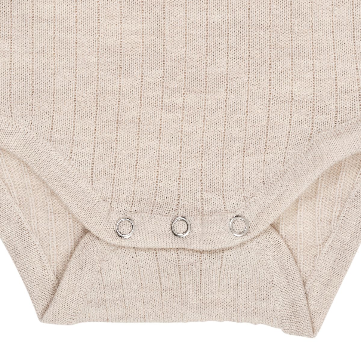 Het Copenhagen Colors merino rib rompertje pale cream melange voelt zacht aan en houdt goed warmte vast. Gemaakt van 100% Merinowol, dus ideaal voor de winter. VanZus