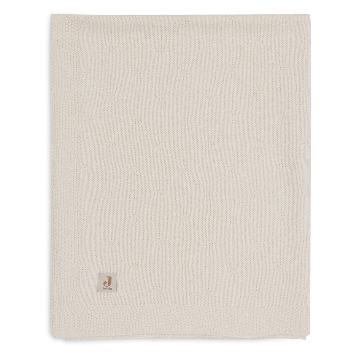 De cosy knit deken in ivory van het merk Jollein is een luxe, gebreide deken van 100% katoen. Perfect voor de wieg (75x100 cm) en biedt warmte en stijl in de babykamer. Ook in andere kleuren. VanZus