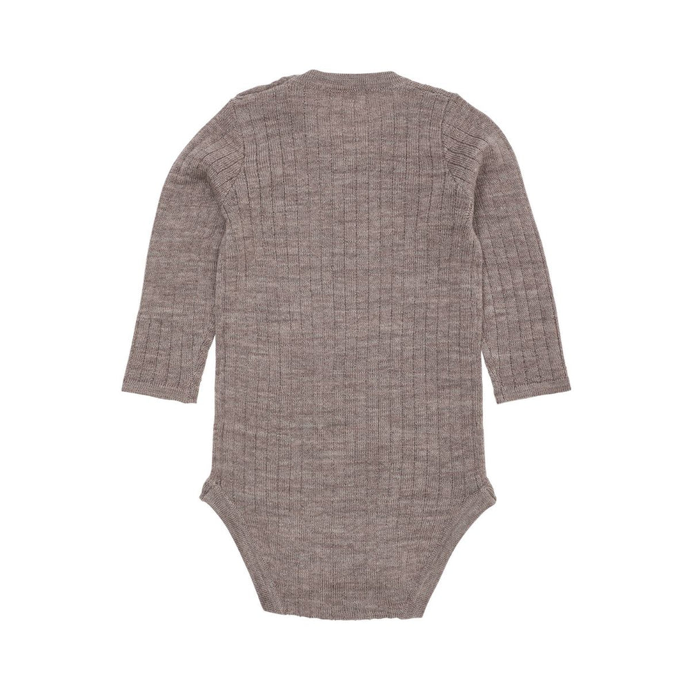 Het Copenhagen Colors merino rib rompertje natural melange is gemaakt van 100% Merinowol. Dit natuurlijke materiaal reguleert de temperatuur en is zacht voor de huid. VanZus