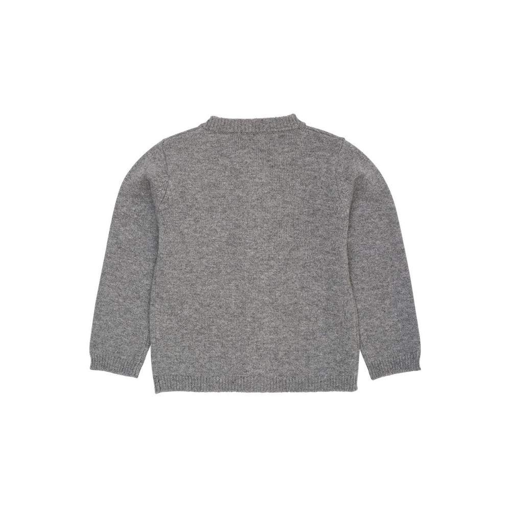 Het Copenhagen Colors cashmere vestje poplin bow dark grey melange/cream is een warme laag met een klassiek accent. De grijze kleur vormt een mooi contrast met de witte strik aan de voorkant. VanZus