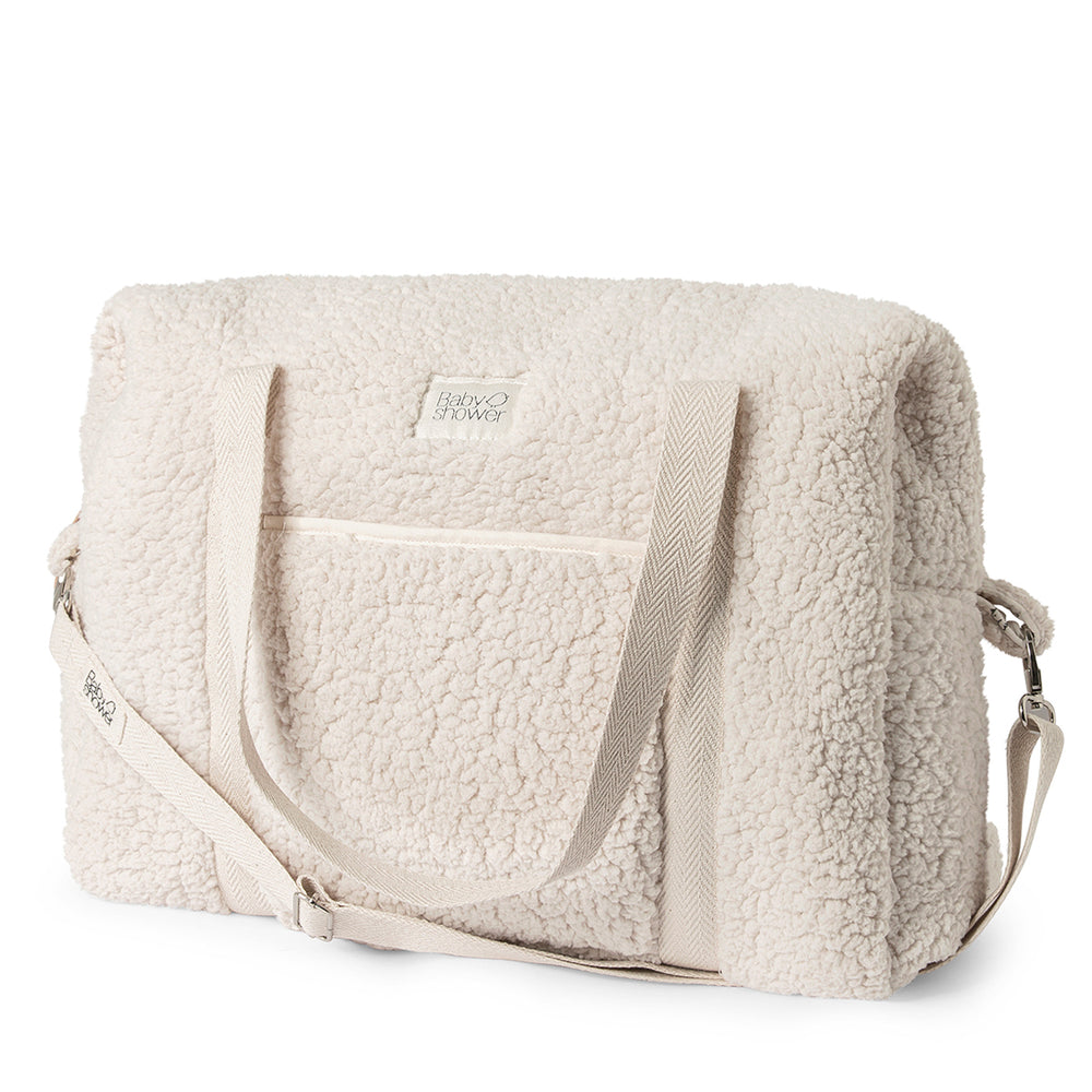 Op zoek naar een stijlvolle luiertas? De mombag camila in mouton van Babyshower is perfect voor onderweg. Handige afsluitbare tas met vakjes, lange hengsels en verstelbare cross-body riem. VanZus