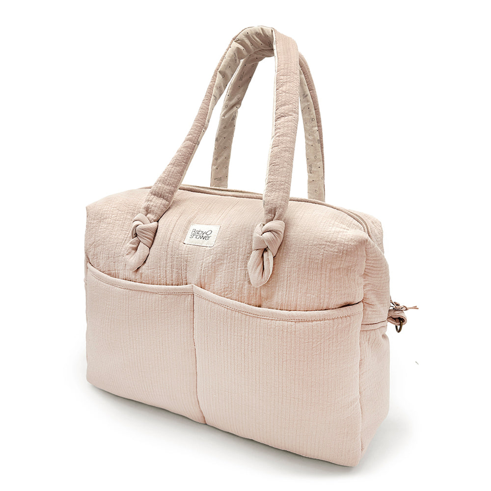 Op zoek naar een stijlvolle luiertas? De mom bag sophie in feel blush is perfect als je op pad gaat met je kindje of gebruik hem zelf als je gaat sporten. Handige afsluitbare tas met vakjes en lange hengsels. VanZus