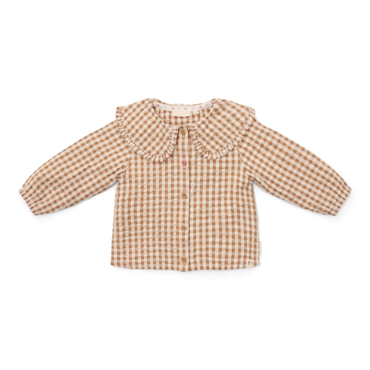 Hoe je de blouse brown check van Little Dutch ook combineert: je meisje zal er geweldig uitzien! De geruite blouse met lange mouwen heeft een bruin-wit patroon en een mooie opvallende kraag met ruches. Zo ziet de blouse er meteen heel bijzonder en meisjesachtig uit. De stof met textuur is van biologisch katoen. VanZus