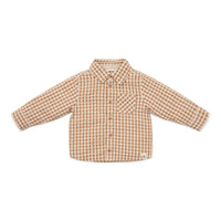 Hoe schattig is deze overhemd met de print brown check van Little Dutch? De ruitjes hebben een leuk en speels effect op je outfit en zijn een mooie toevoeging aan de garderobe van je kleintje! VanZus