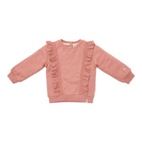 Deze schattige sweater in warm pink van Little Dutch is een heerlijk zacht voor je kleine meisje! Gemaakt van biologisch katoen met extra zachtheid aan de binnenkant. De ruches met geborduurde bloemetjes langs beide zijden van de trui en een bloemborduursel op één van de mouwen voegt een leuk detail toe.  VanZus