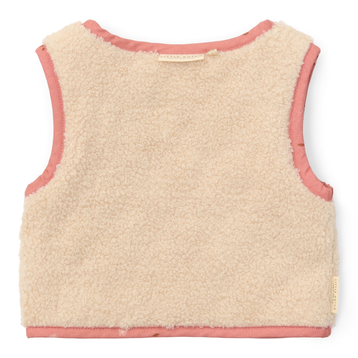 Met het omkeerbaar gilet van Little Dutch in de kleur sand/warm rose blooming flower voeg je een vleugje stijl toe aan de outfit van je kind. Het gilet kan op twee manieren gedragen worden: de kant van de teddystof of de kant met bloemetjesprint. VanZus