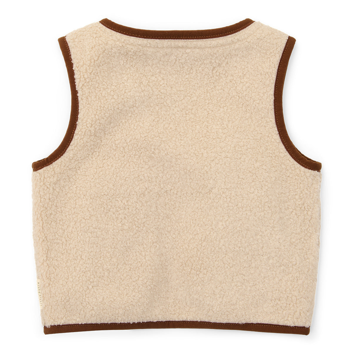 Met het gilet van Little Dutch in de kleur sand voeg je een vleugje stijl toe aan de outfit van je kind. Het gilet is omkeerbaar en kan op twee manieren gedragen worden: de kant van de teddystof of de kant met ruitjesprint. VanZus