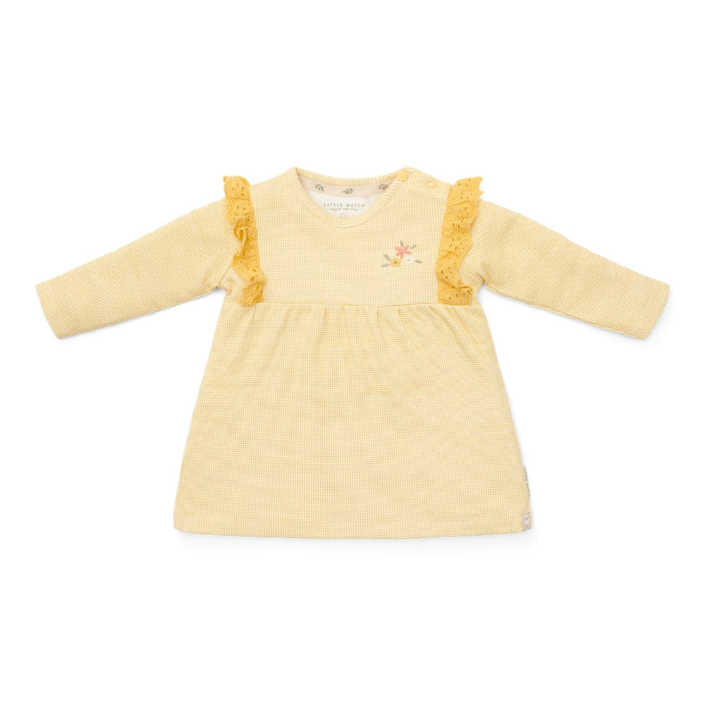 De Little Dutch flower jurk met lange mouw in de kleur warm yellow check is een prachtige jurk voor je kleintje. De jurk is gemaakt van een zachte stof en heeft een schattige gele kleur, wat zorgt voor frisse en leuke uitstraling. VanZus