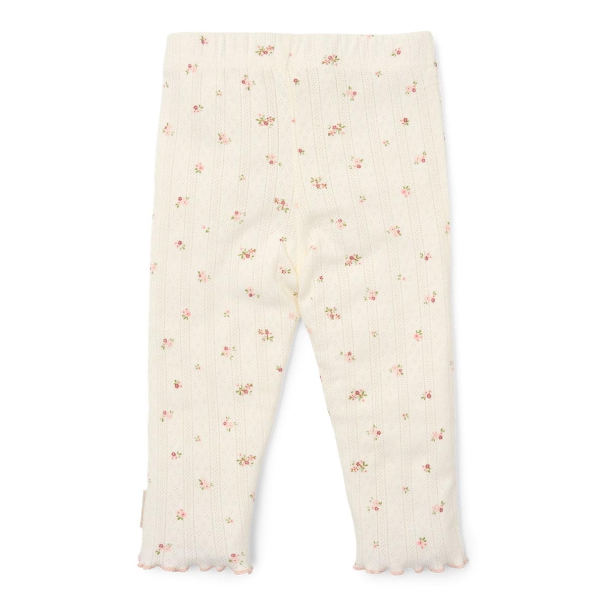 Ga naar dromenland en droom de mooiste dromen in deze tweedelige pyjama fairy blossom van Little Dutch.  De pyjama bestaat uit een pyjamabroek en een pyjamashirt. De pointelle pyjama heeft een schattige, romantische bloemenprint. De mouwen en broek hebben een geschulpte rand.  VanZus