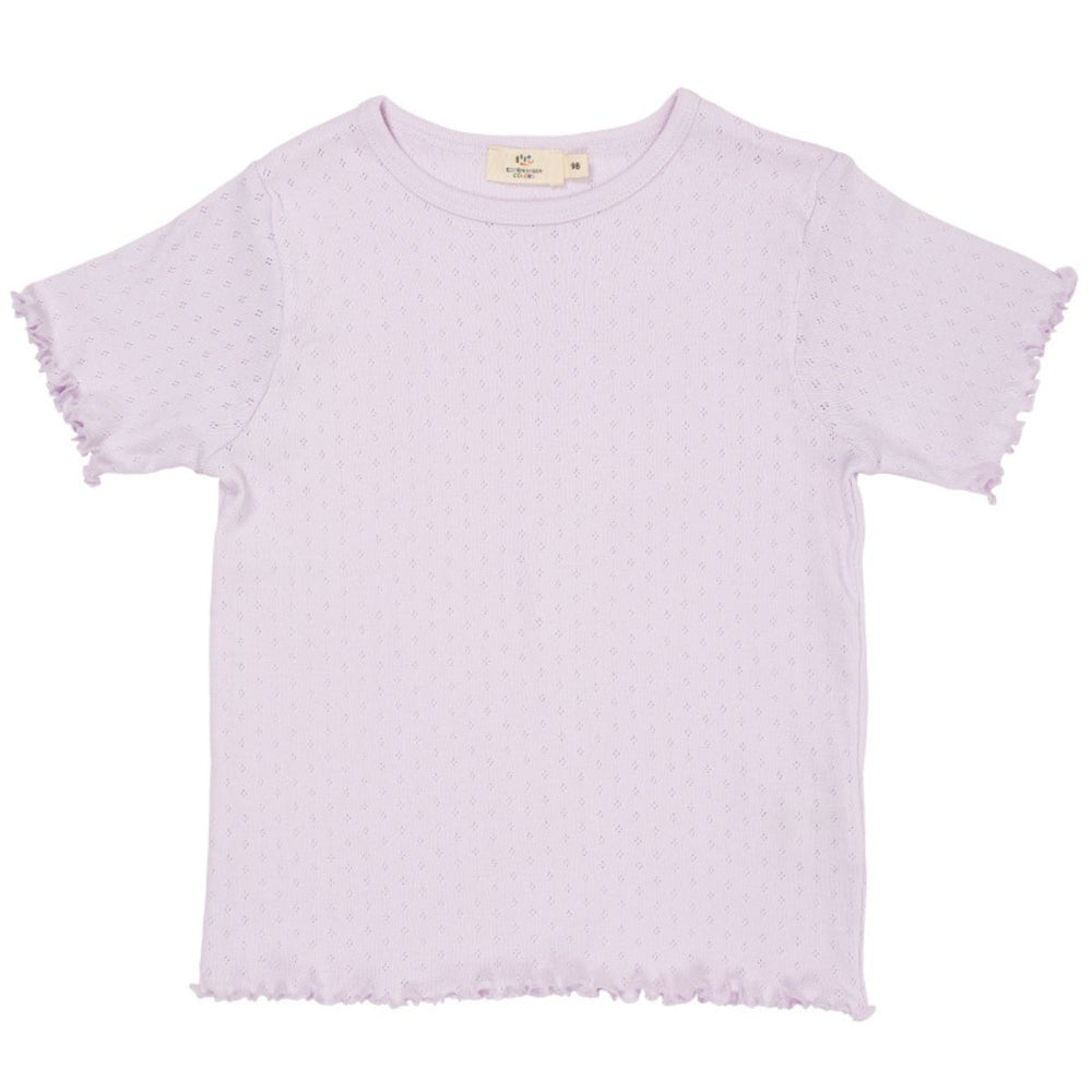 Het Copenhagen Colors knit pointelle shirt in de kleur lavender is een prachtige toevoeging aan de kledingkast van je kindje. Dit shirtje is gemaakt van biologisch katoen. VanZus.