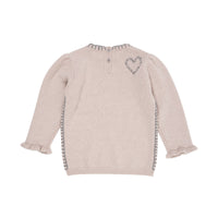 Zeg nu zelf, deze kasjmier trui heart in de kleur beige van het merk Copenhagen Colors is toch een absolute must have? Niet alleen houdt deze trui je kindje lekker warm, je kind ziet er ook onwijs schattig uit in deze leuke trui. VanZus