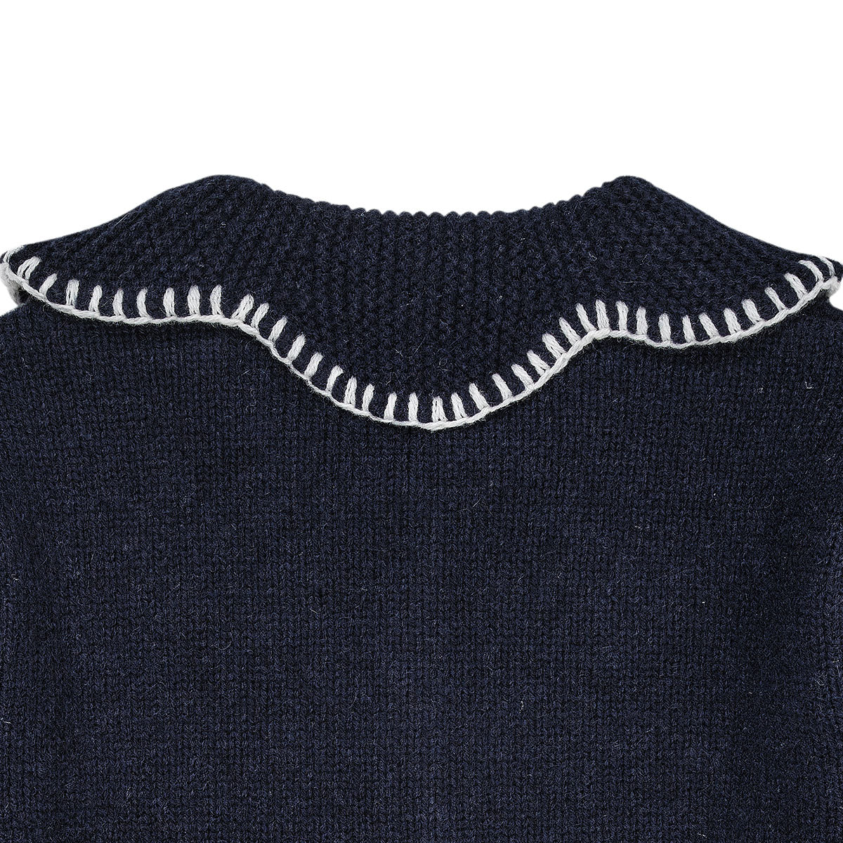 Houd je kindje lekker warm met dit kasjmie vestje met kraag in de kleur navy van het merk Copenhagen Colors. Dit prachtige vestje is gemaakt van kasjmier. Je voelt dat het vestje gemaakt is van hoge kwaliteit materialen. VanZus