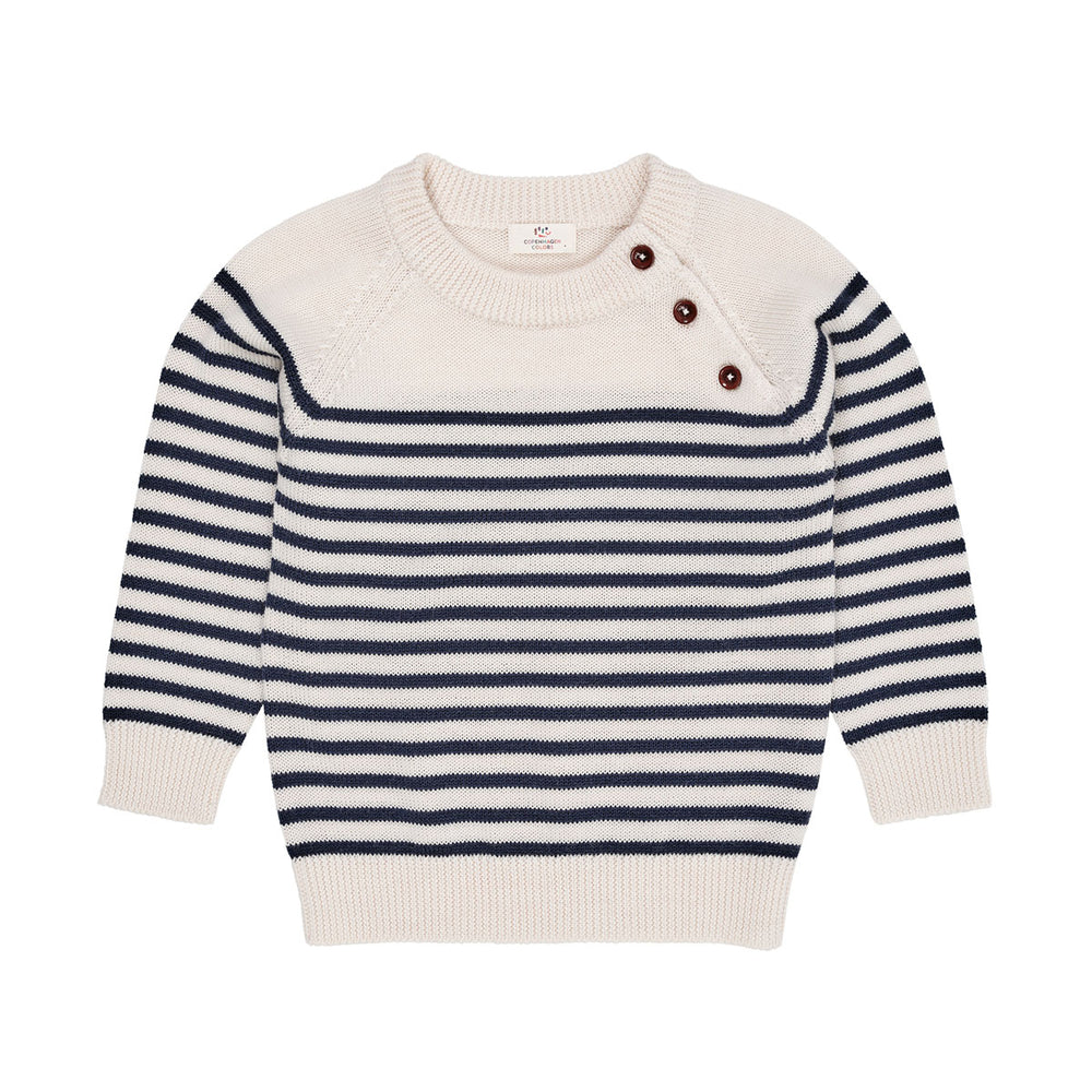 Het is altijd fijn om een mooie trui in huis te hebben dat je zowel uit de kast kan trekken voor alledaagse outfits, als voor bijzondere gelegenheden. Deze merino classic gestreepte trui in de kleur cream/navy van het merk Copenhagen Colors is een prachtige basic met eyecatching details. VanZus