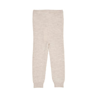 Deze heerlijke zachte merino classic rib legging met trekkoordje in de kleur pale cream melange voelt voor je kleintje als een tweede huid, zo zacht voelt deze legging aan. De legging heeft een mooie beige kleur en is de ideale basic om comfortabele en stijlvolle outfits mee samen te stellen. VanZus