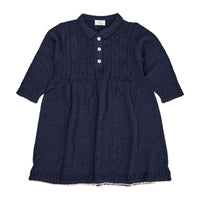 Een superschattig jurkje dat ook nog eens heerlijk warm is en comfortabel zit? Dat is deze merino pointelle jurk met kraag in de kleur navy/cream van het merk Copenhagen Colors absoluut! Deze geweldige jurk is geschikt voor verschillende gelegenheden en zal je kindje heel lief staan. VanZus