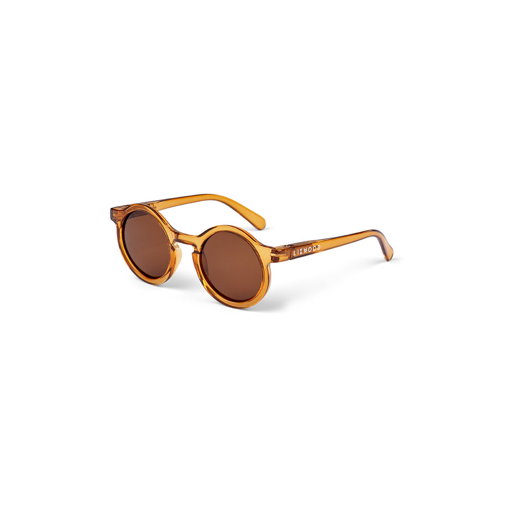De Liewood darla zonnebril mustard is het perfecte accessoire voor jouw kindje tijdens de lente en zomer. Deze toffe zonnebril heeft dankzij de ronde glazen een retro en speelse look. VanZus.