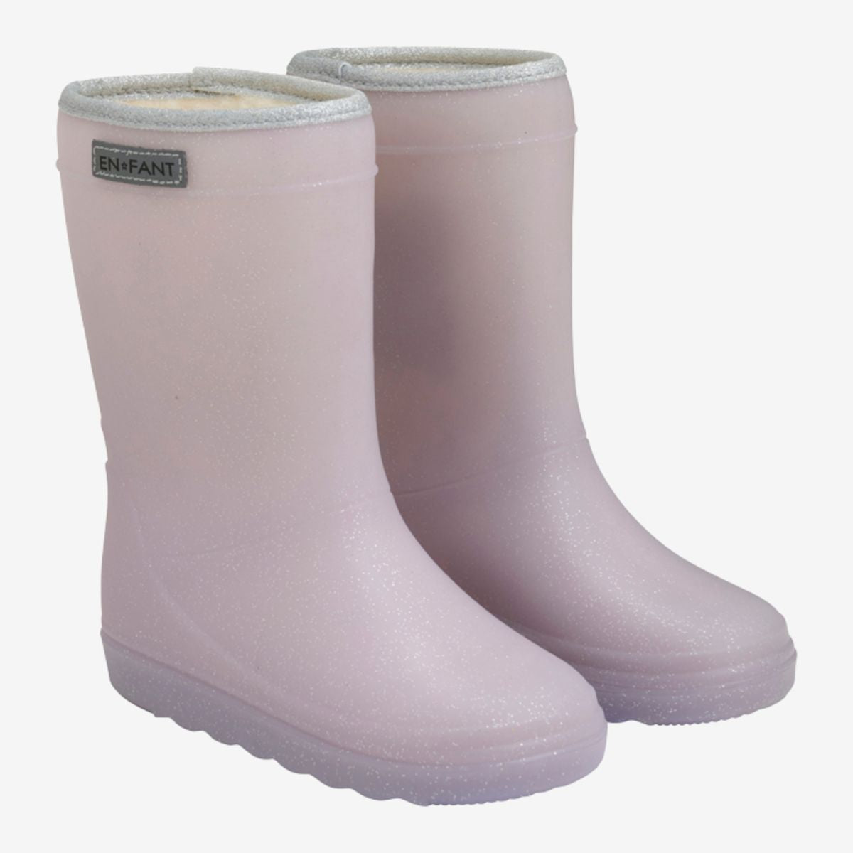 Bescherm de voeten van je kleintje tegen fikse regenbuien met deze thermoboots in glitter burnished lilac van het vrolijke merk En Fant. De outfit van jouw mini me outfit zal zeker schitteren met deze glitterende regenboots in een prachtige lila kleur. VanZus