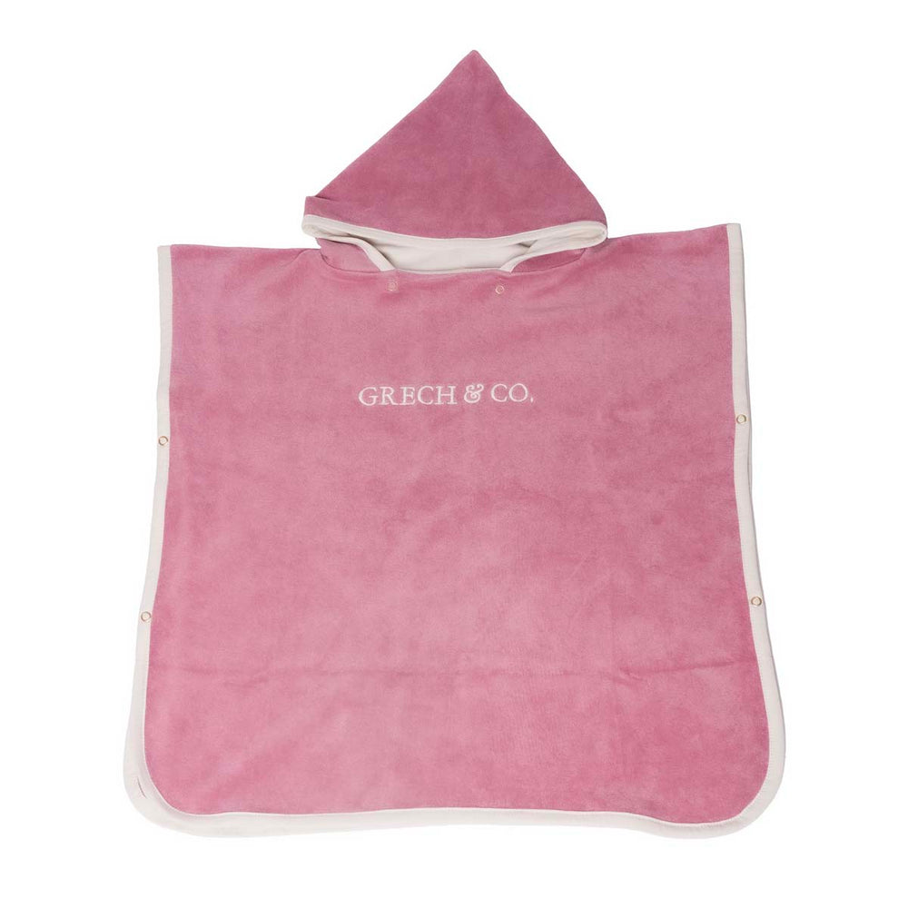Na het badje, strand of zwembad pak je je kindje heerlijk warm in met de badponcho mauve rose van Grech & Co. Opdrogen, warm worden en comfortabel zijn. De badcape heeft een capuchon en drukknoopjes. VanZus