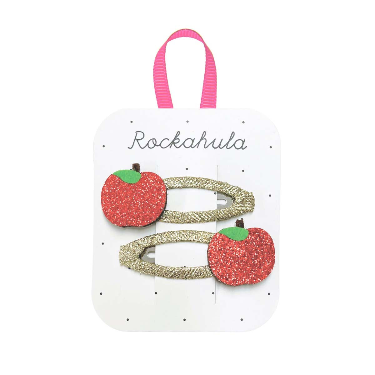 Kijk hoe schattig de rosy red apple  speldjes van Rockahula zijn! De set bestaat uit 2 speldjes, versierd met goud grosgrain lint en rode glitter appeltjes. Hip en handig. Ook leuk als cadeau. VanZus