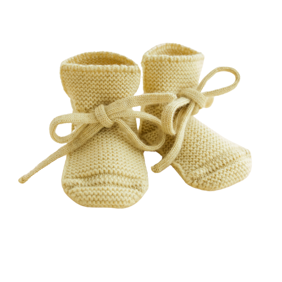 Heerlijk warm en comfortabel: de babyslofjes in de kleur light yellow van Hvid. Gemaakt van zacht merinowol, verkrijgbaar in maten 0-9 maanden en 9-15 maanden, met handige strik zodat ze goed blijven zitten. VanZus