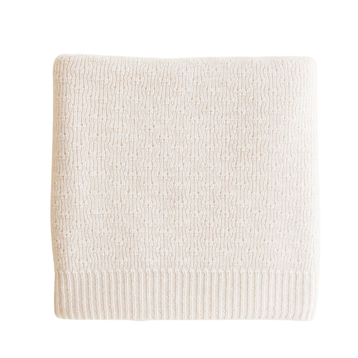 Deken dora van Hvid, in cream, biedt warmte en comfort voor je baby met zacht merino lamswol. Ribgebreid, zacht en warm. Een stijlvolle deken. In diverse kleuren. VanZus