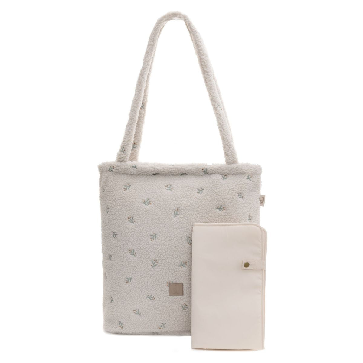 De luiertas shopper teddy lovely van Jollein biedt luxe en functionaliteit met zijn ultra-zachte teddy stof. Ruim, georganiseerd en stijlvol, met handvatten en een schouderriem voor optimaal comfort. VanZus