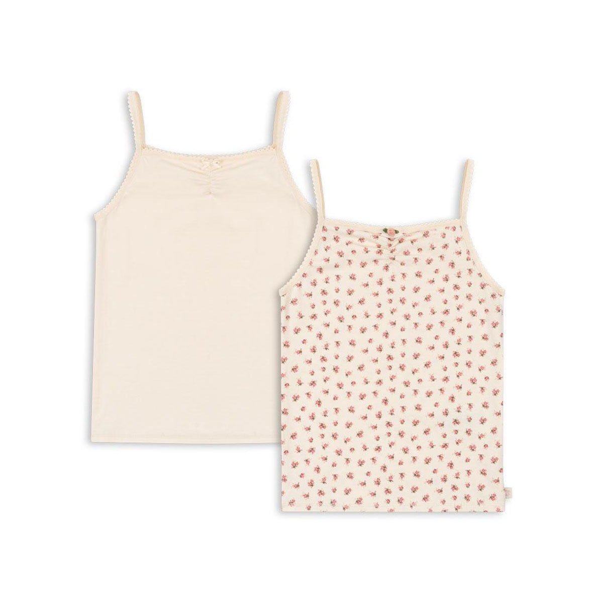 Een simpel hemdje is is altijd fijn om in de kast te hebben hangen. Heerlijk voor warme zomerdagen of voor onder een outfit voor extra warmte. Dit basic 2-pack strap top setje in de kleuren buttercream/bloomie zijn dan ook ideaal! VanZus