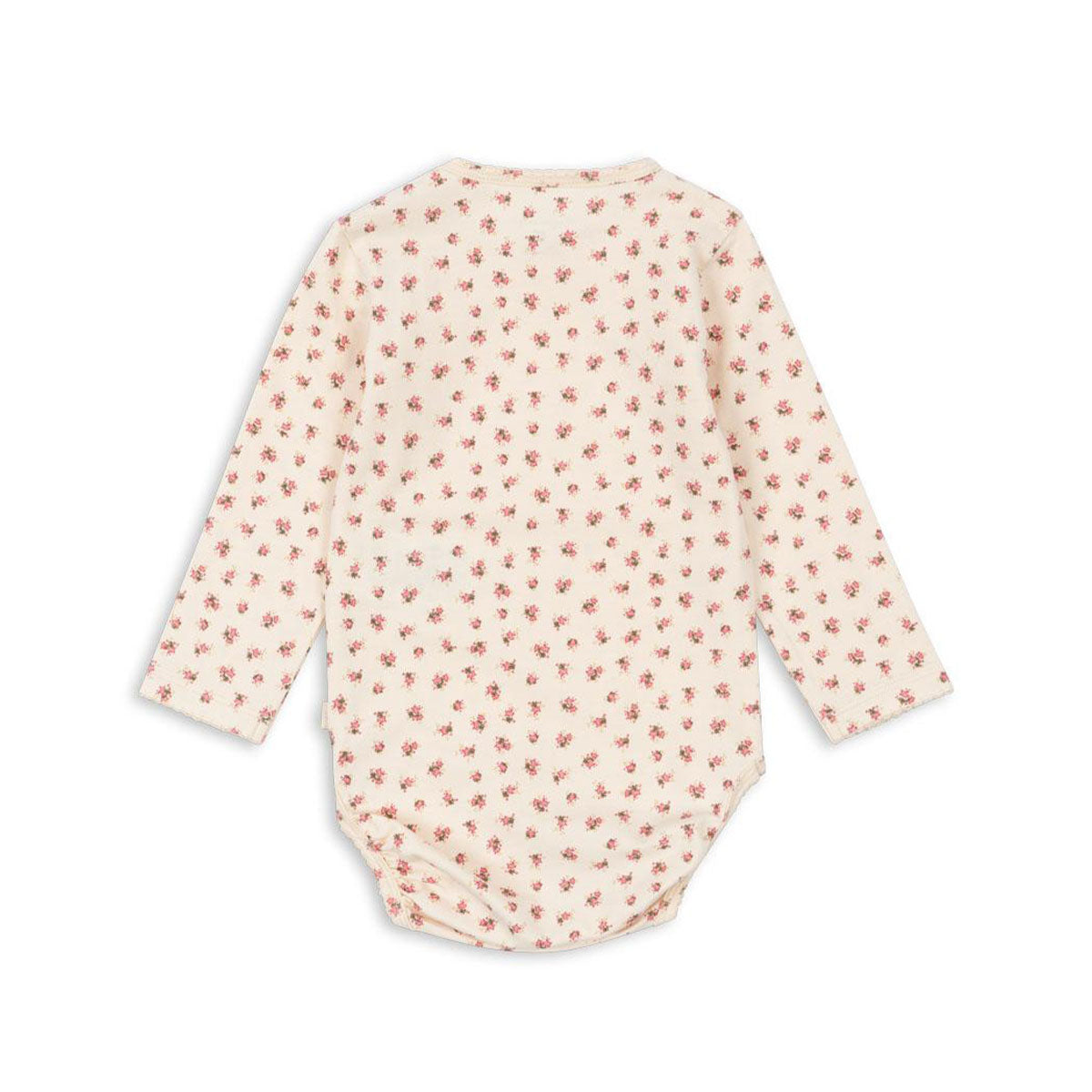 Hoe schattig is dit basic lange mouwen rompertje in de kleur bloomie van het merk Konges Slojd? Deze onesie is de ideale basic en kan met allerlei items gecombineerd worden, zoals bijvoorbeeld met een lekker vestje. VanZus