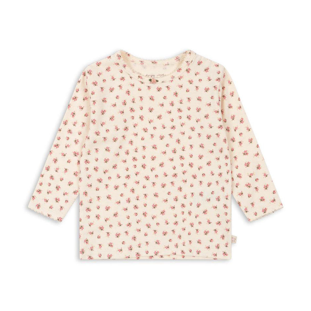 Een basic shirt is is altijd fijn om in de kast te hebben hangen. Ideaal om leuke outfits mee te maken en makkelijk te combineren met een vestje of trui voor een warme look. Dit basic shirt in de kleur bloomie van het merk Konges Slojd dan ook ideaal! VanZus