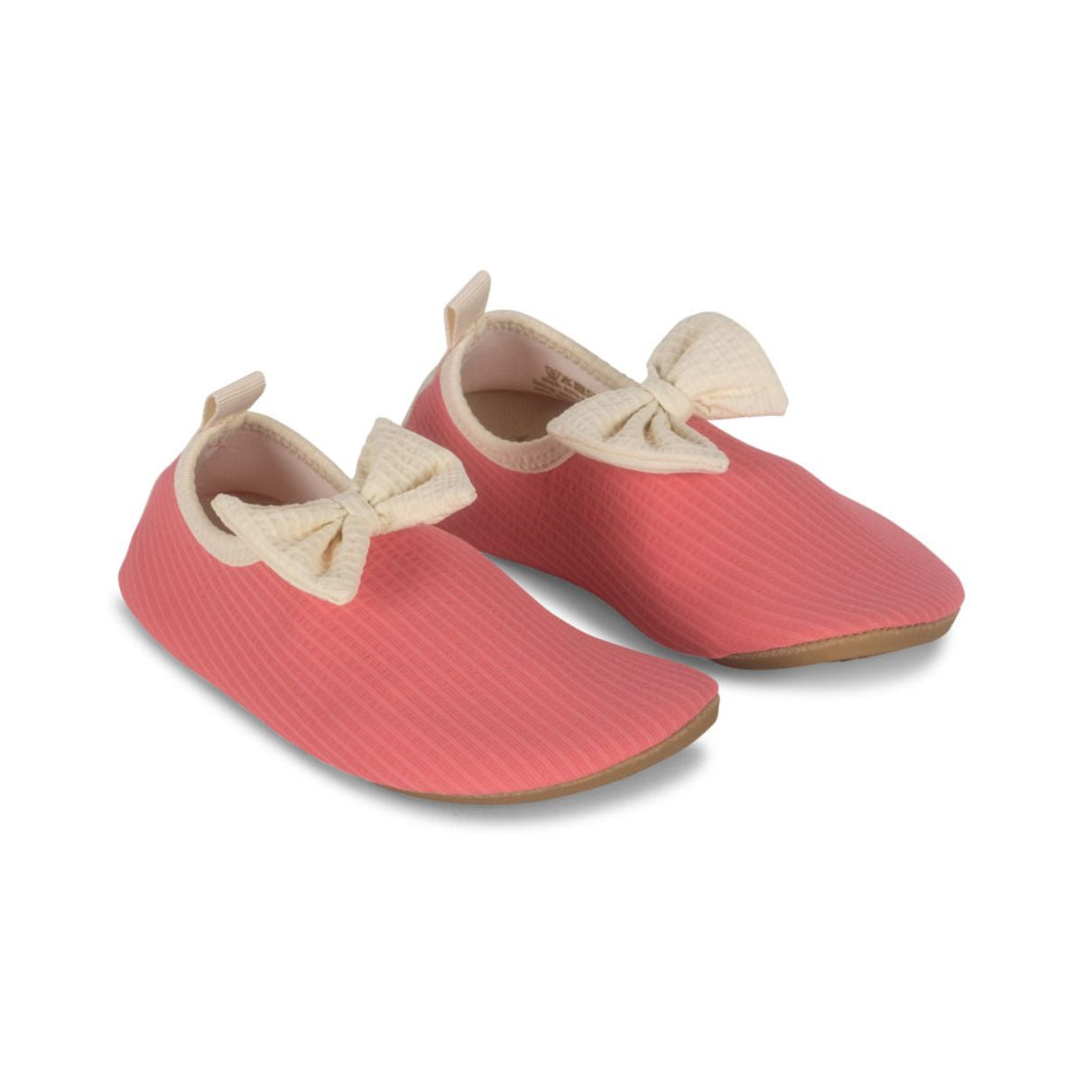 De Konges Slojd bowie zwemschoenen in bubblegum roze zijn ideaal voor waterplezier. Antislip en UV-bescherming. Perfect voor strand en zwembad. Combineer met bijpassende bikini, badpak of zonnehoed. VanZus