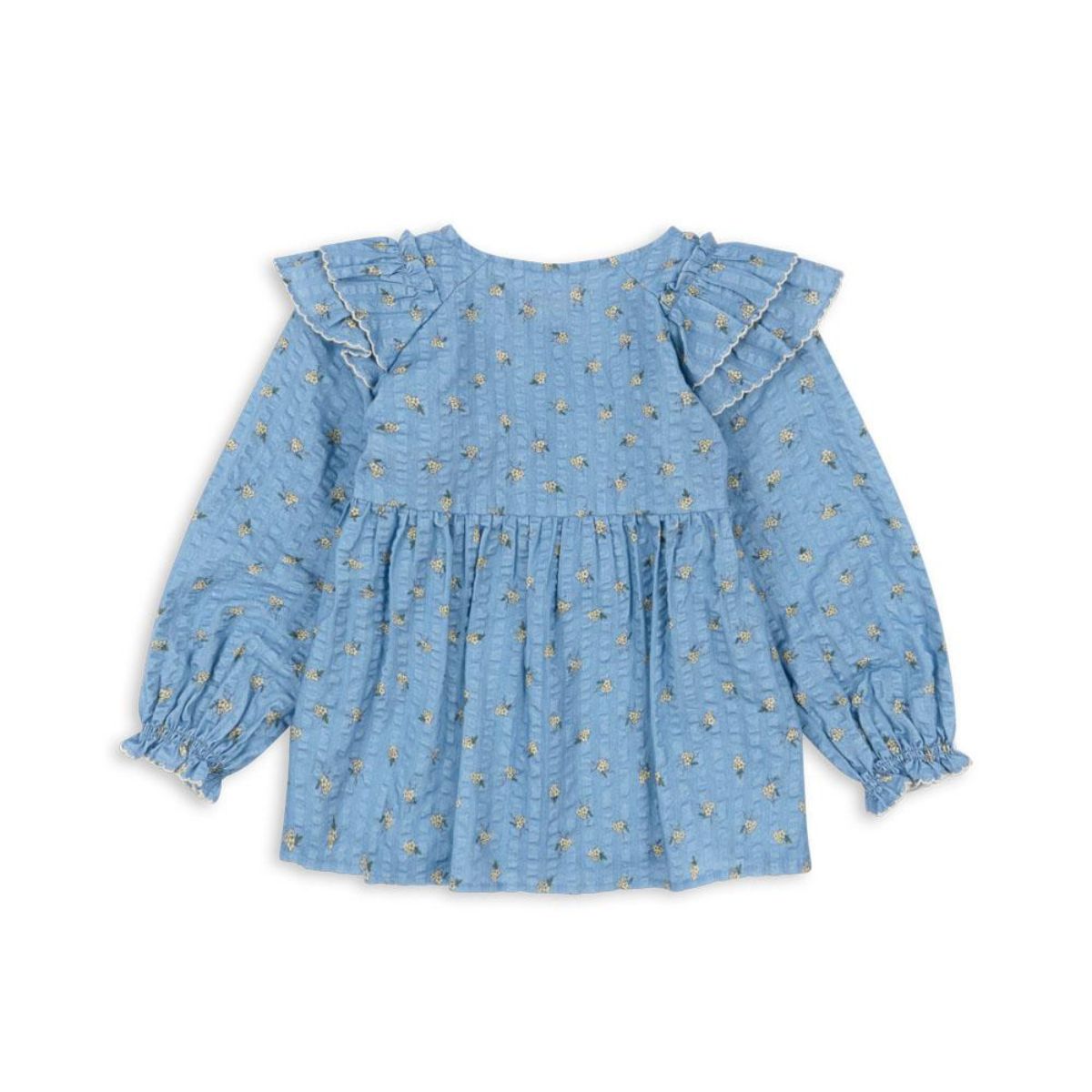 De Konges Slojd kim ruches blouse billie blue is een stijlvolle toevoeging aan de kindergarderobe. Gemaakt van zacht, biologisch katoen met schattige ruches en een druivenprint, perfect voor elke gelegenheid!