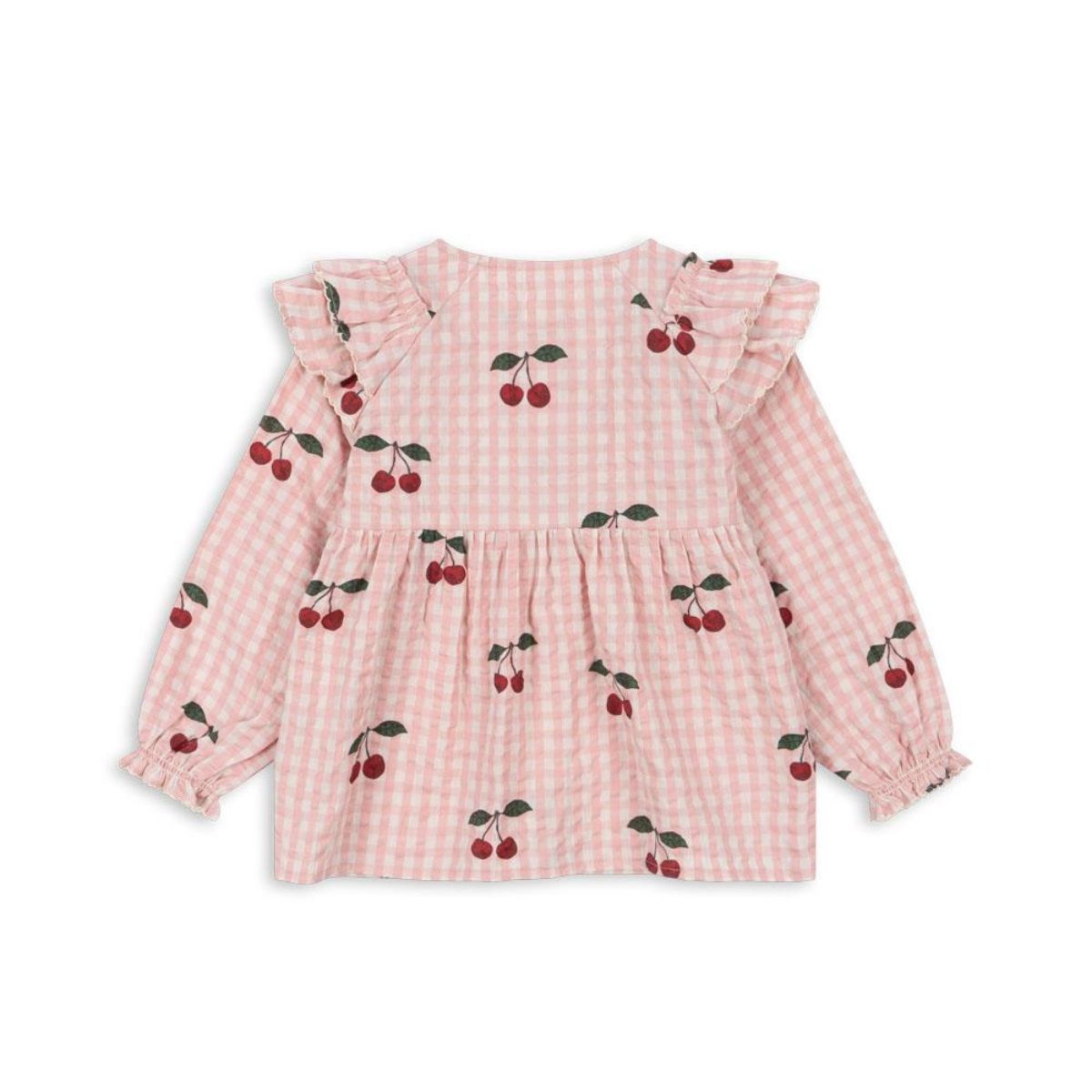 De Konges Slojd kim ruches blouse cherry check is een stijlvolle toevoeging aan de kindergarderobe. Gemaakt van zacht, biologisch katoen met schattige ruches en kersenprint, perfect voor elke gelegenheid! VanZus