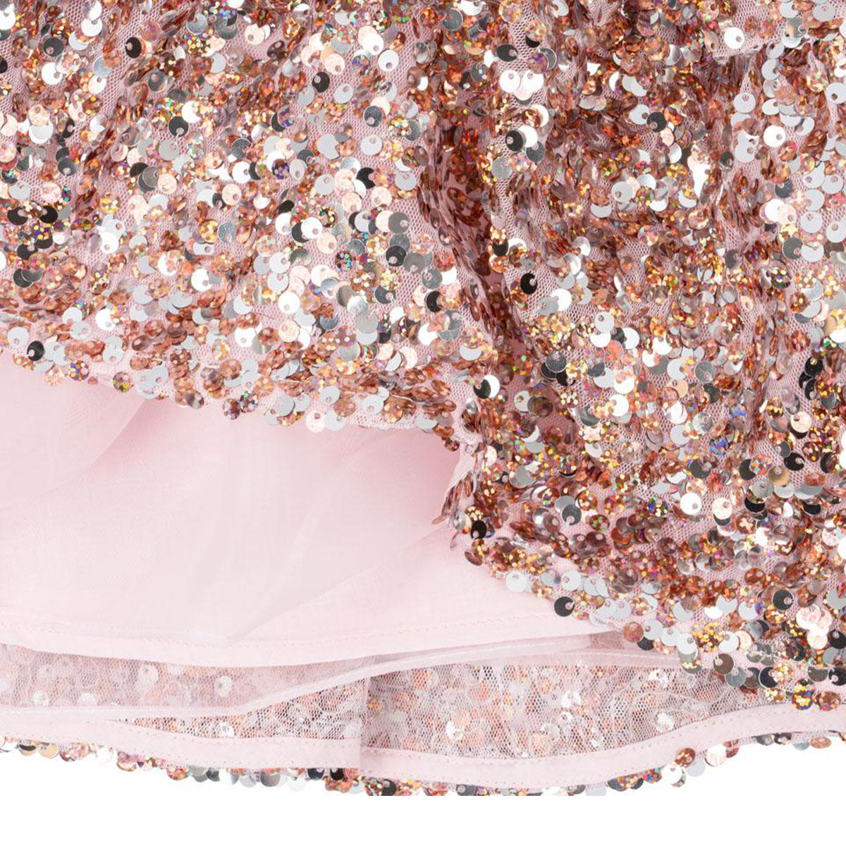 Roze mét glitters. De lila jurk met pailletten in de kleur grey/rosa van het merk Konges Slojd is een absolute showstopper! Deze jurk is helemaal bezaaid met glinsterende pailletten. Ideaal voor kerst of voor een feestje! VanZus