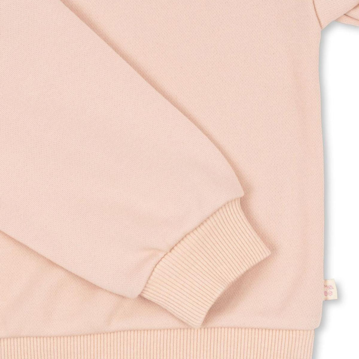 Het Konges Slojd lou glitter sweatshirt cameo rose is een must-have voor elke garderobe. Van zacht biologisch katoen, biedt het comfort en een trendy uitstraling met glitters, perfect voor school of casual uitjes! VanZus