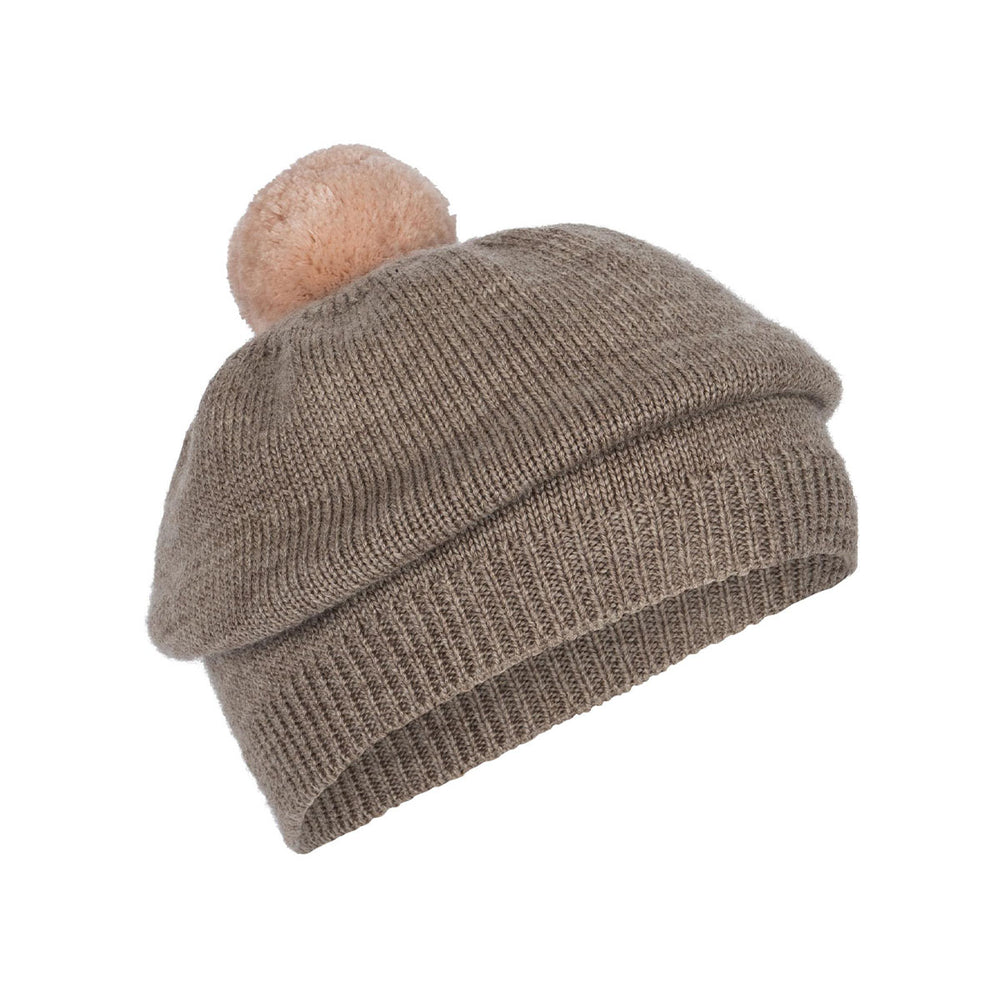 Je kindje is warm én stylish met dit leuke mutsje op! De louli baret muts in de variant soft brown van het merk Konges Slojd is een echte eyecatcher die ook nog eens heel comfortabel zit. Het is het ideale item om lekker warm te blijven tijdens de koudere maanden. VanZus