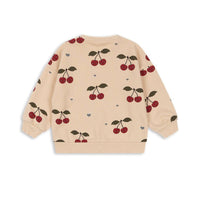 Het Konges Slojd lou sweatshirt cherry bestie is een must-have voor elke garderobe. Van zacht biologisch katoen, biedt het comfort en een trendy uitstraling met kersenprint, perfect voor school of casual uitjes! VanZus