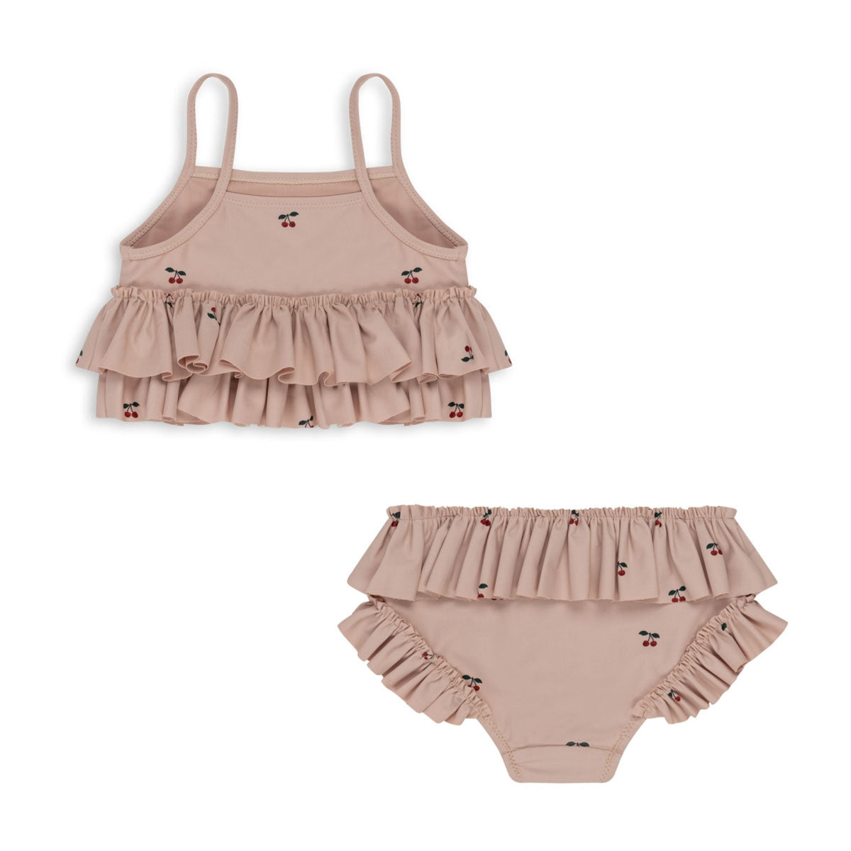 Met de Konges Slojd manuca frill bikini cherry blush is jouw kleintje helemaal klaar voor de zomer! Deze leuke bikini is gemaakt voor zonnige dagen en veel waterpret. De roze bikini met schattige kersjes is perfect voor een uitje naar het strand of waterpret in het zwembad. De fijne en comfortabele stof is gemaakt van 80% polyester en 20% elastaan. VanZus