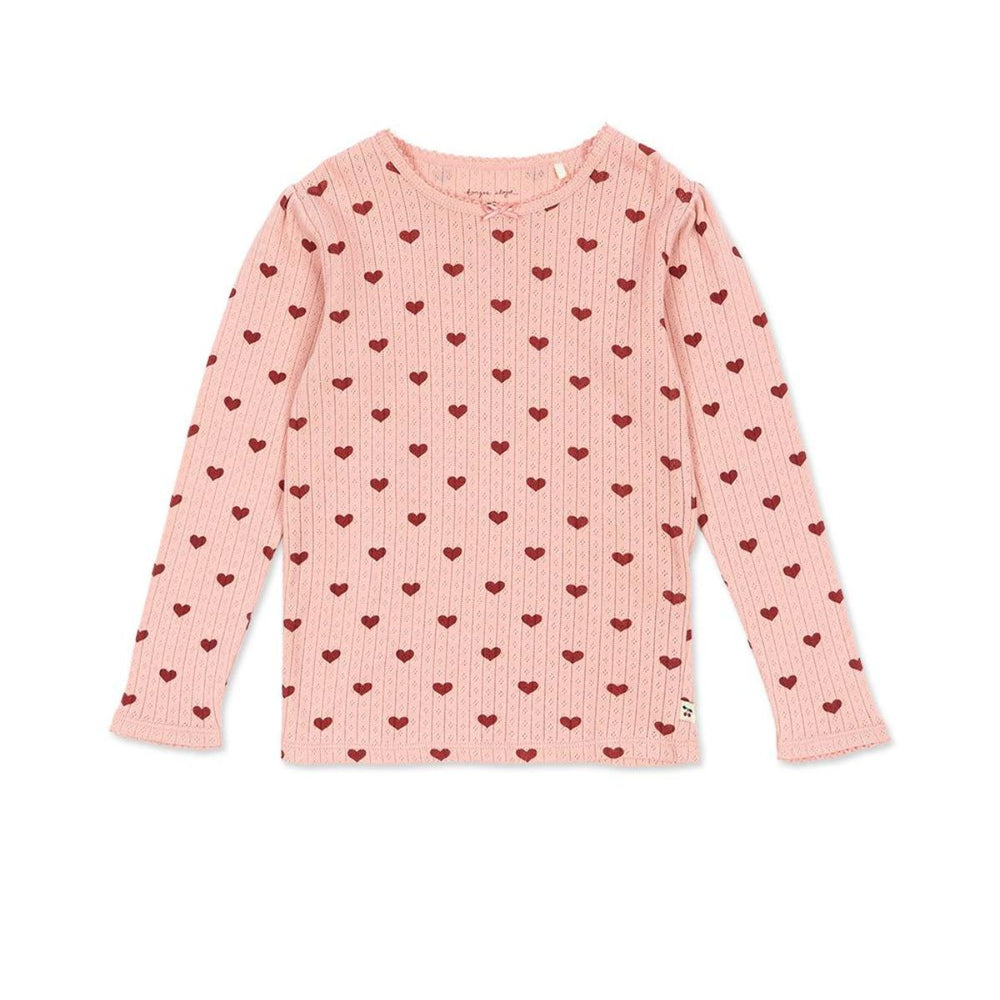 Konges Slojd minnie blouse amour rouge is gemaakt van 100% biologisch katoen met een schattig patroon. In lieve kleur roze, met lange mouwen. Mix & Match met andere leuke items. VanZus