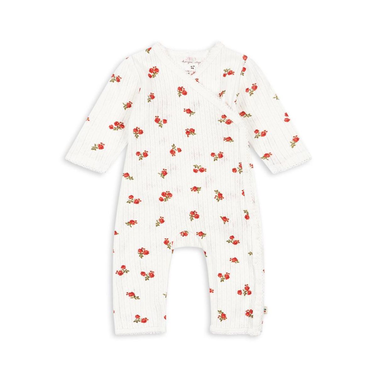 De minnie newborn onesie in de variant rose red van Konges Slojd is een schattige, zachte jumpsuit van 100% biologisch katoen. Perfect voor je kleintje, met lieve bloemenprint. VanZus