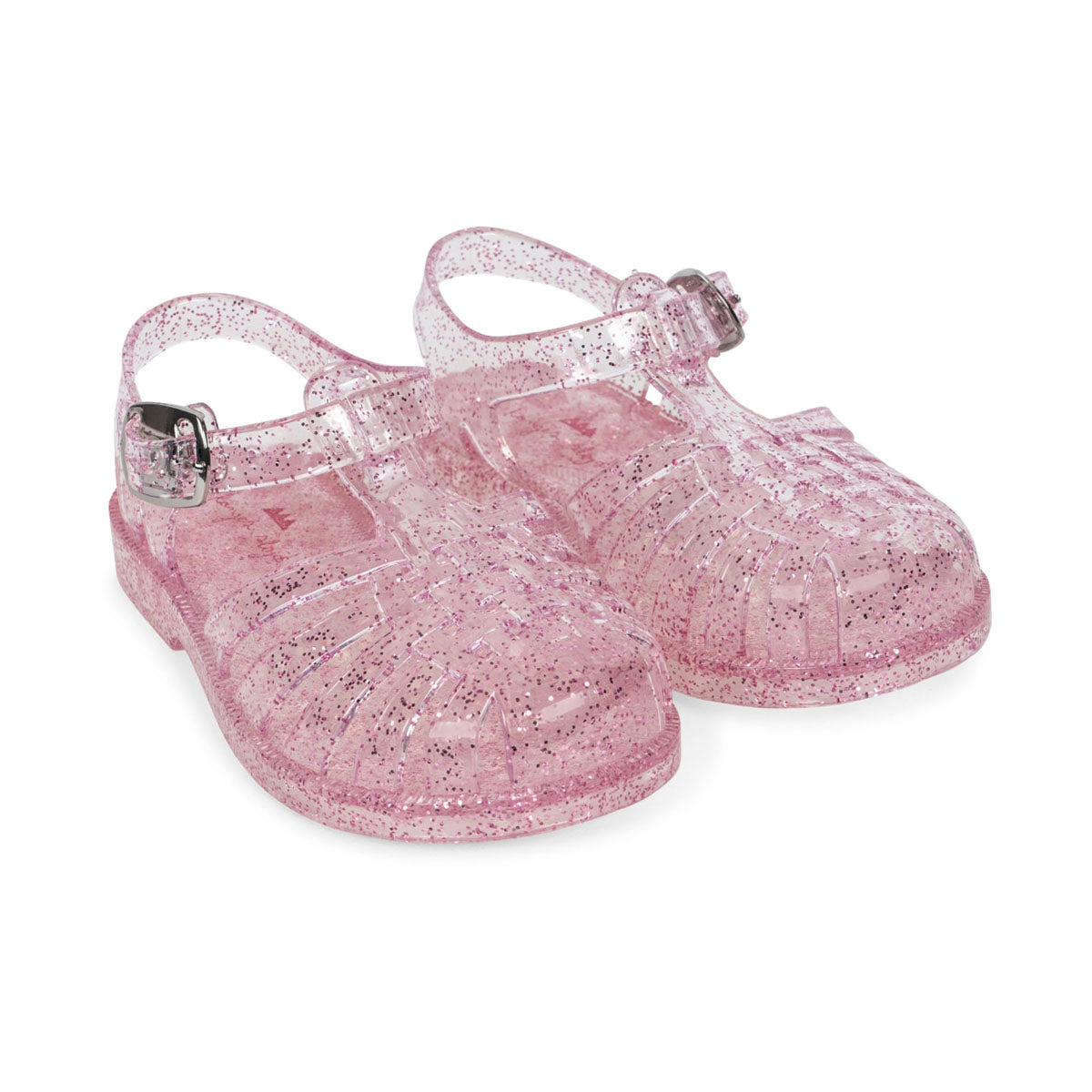 Sparkle maar met de nea waterschoenen glitter rose van Konges Slojd!  Met deze roze waterschoenen met glitter val je op! De waterschoentjes sluiten met een drukknoop en een gesp en zijn hierdoor goed verstelbaar. De onderzijde van de waterschoenen is voorzien van reliëf voor extra grip.  